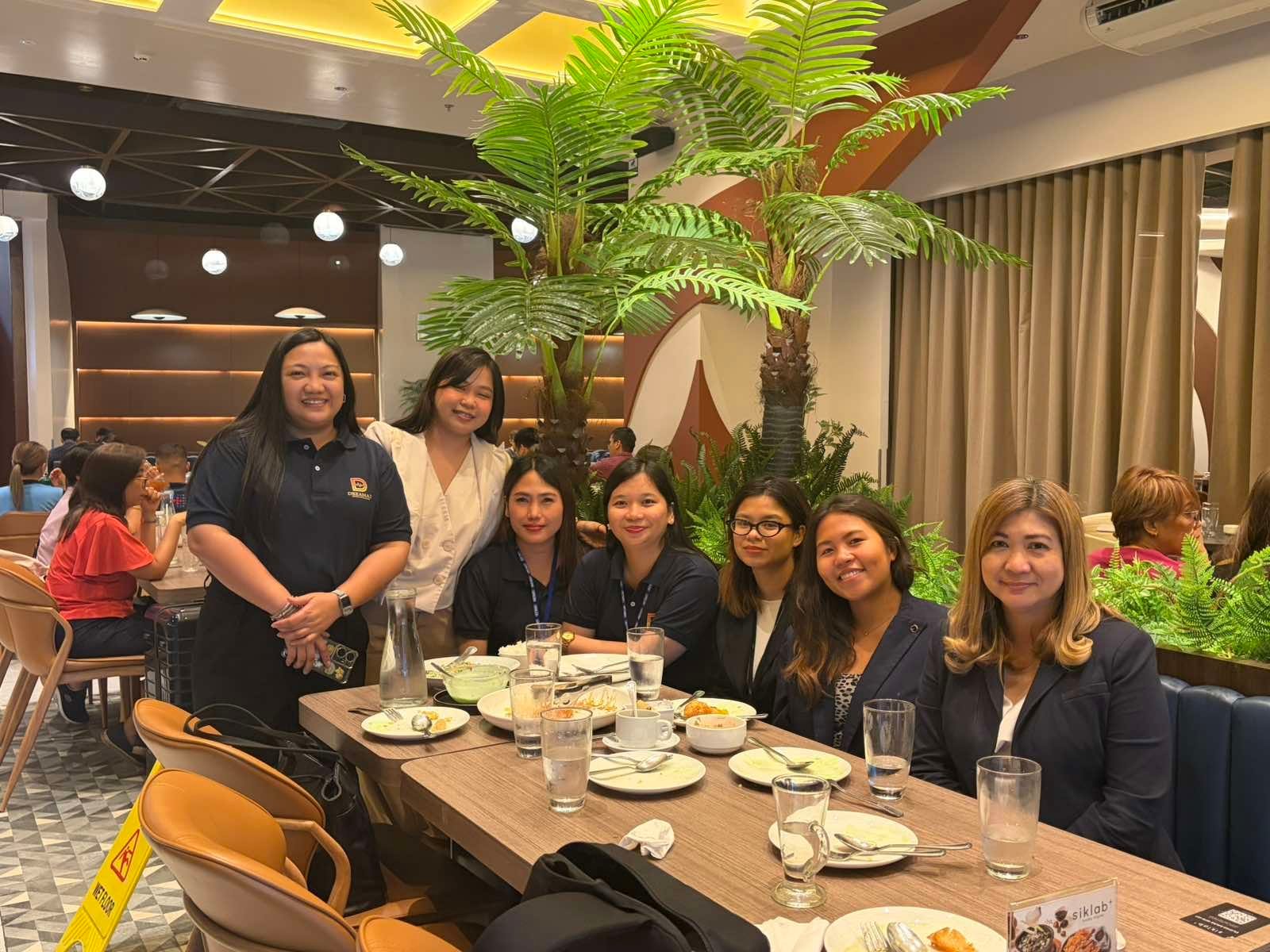 Dreamax team at a dinner celebration