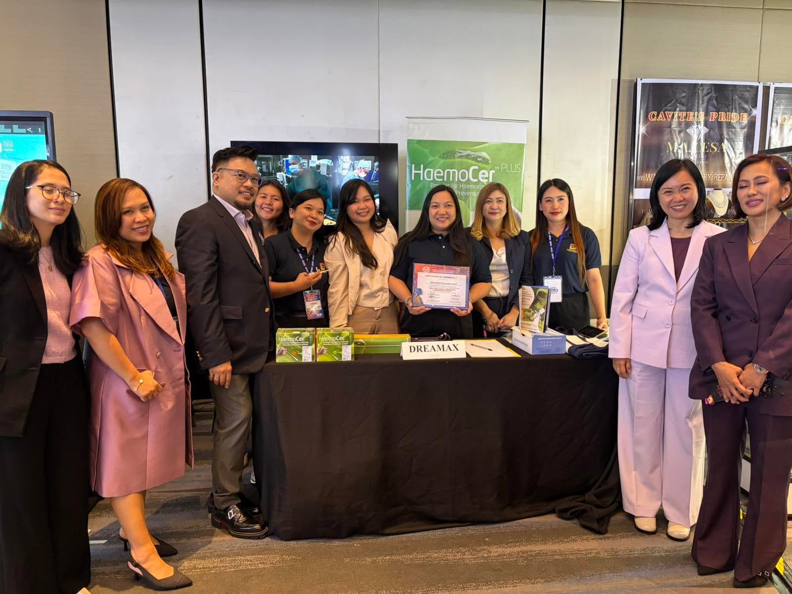 Dreamax team receiving a certificate of recognition
