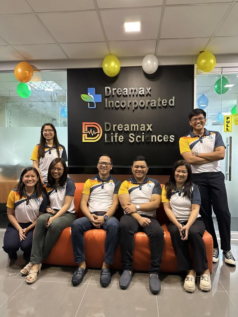 The Dreamax Incorporated team celebrating together